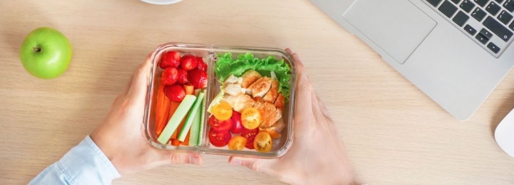 Healthy prepped lunch helps employee succeed in office weight loss challenge. Dr. Higa shares how you turn it into long term success.
